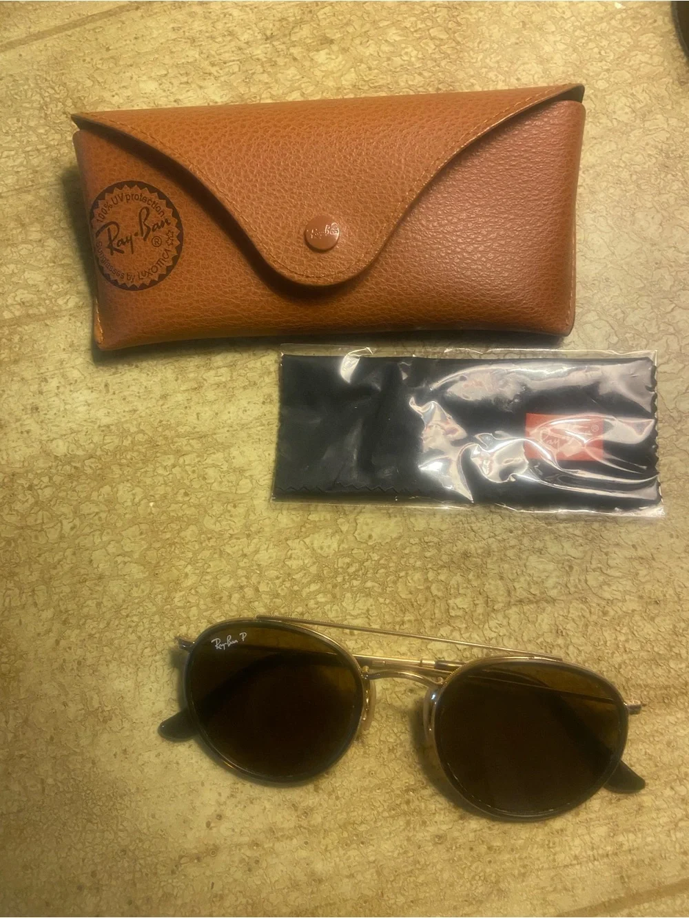 Ray-Ban Round, Polarized Sunglasses in Brown Lenses and Gold Frames